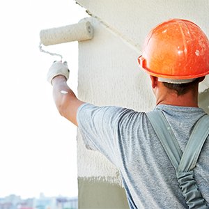 painter paingting exterior of building